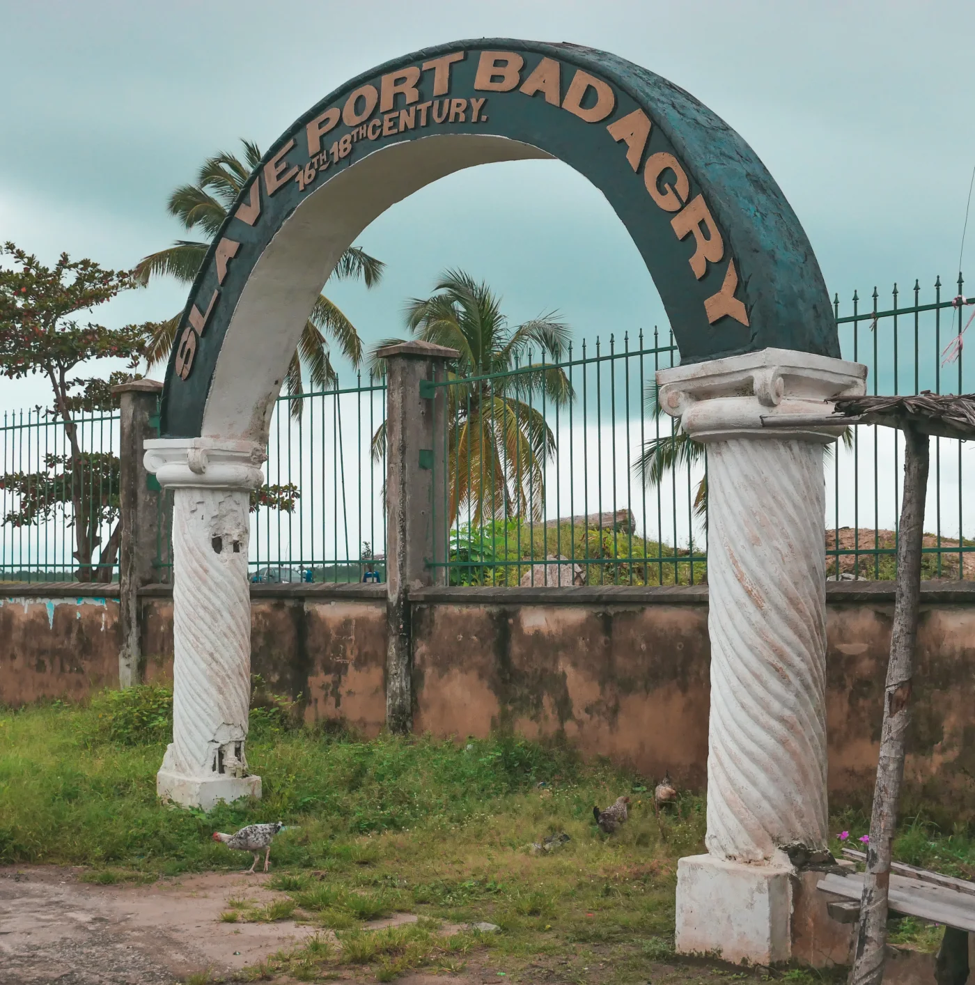 An arch at the Badagry waterfront marks the locally interpreted slave-port route.