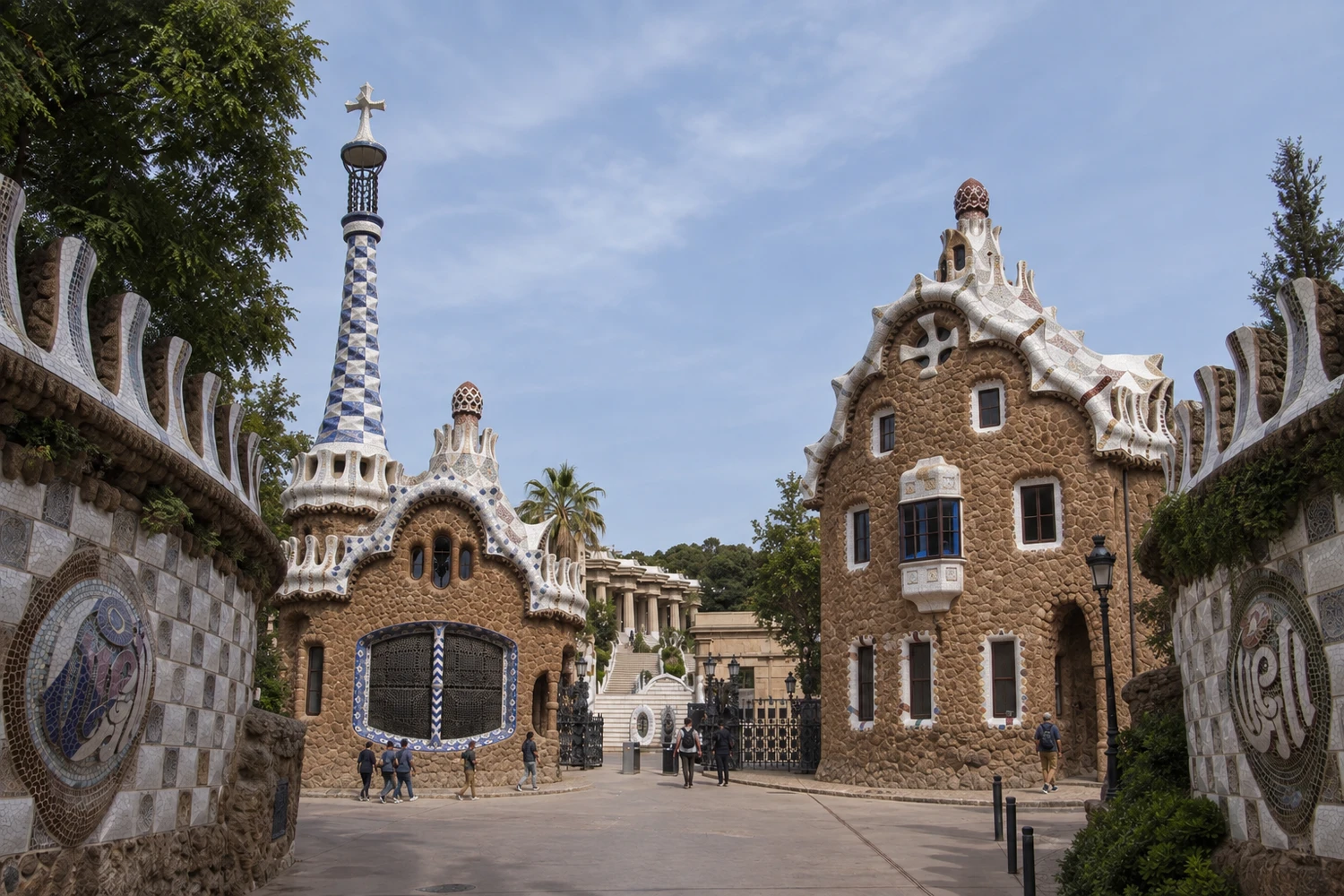 The Olot entrance is framed by a rustic wall and two asymmetrical porter’s-lodge pavilions