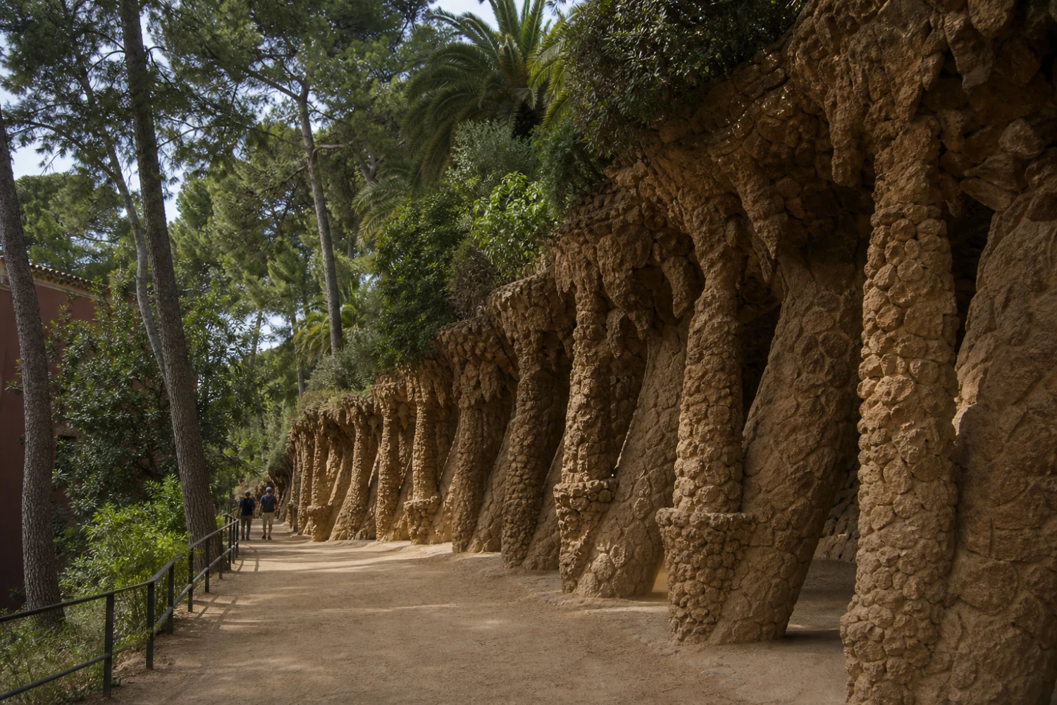 The Laundry Room Portico forms a stone wave above a shaded path beside Casa Larrard’s former garden