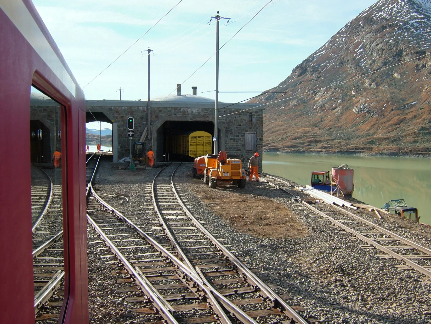 RhB maintenance workers and equipment beside the tracks at Ospizio Bernina in October 2007.