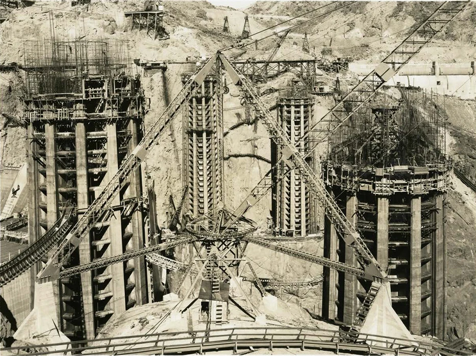 Hoover Dam intake towers rise from construction works in 1934 before Lake Mead filled around them.