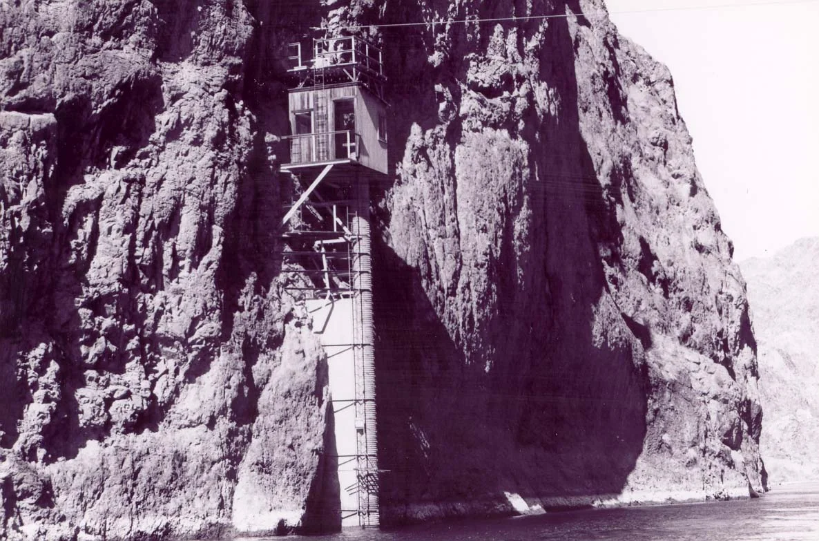 A historic gaging station stands at Willow Beach beside the Colorado River.