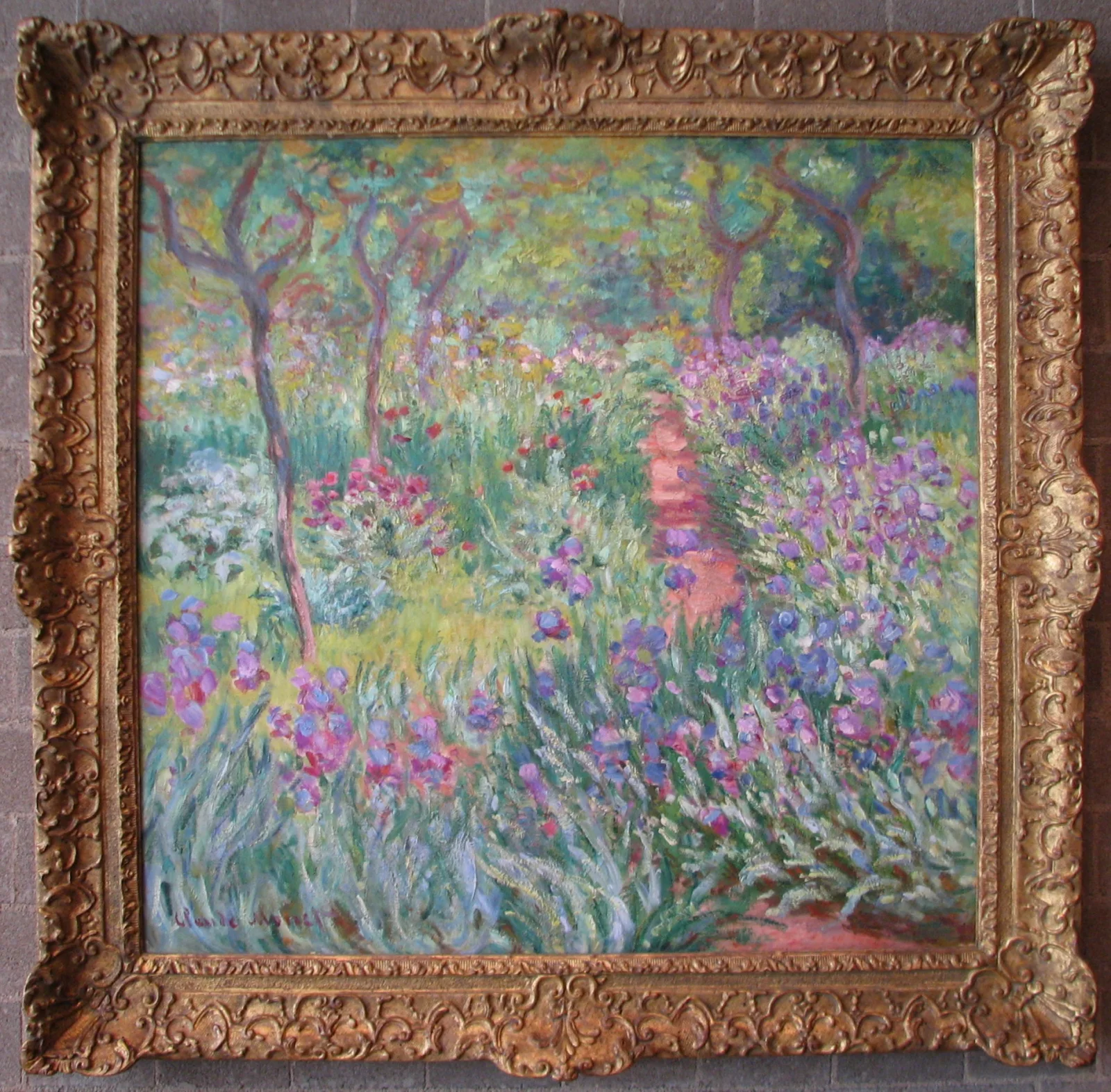 Claude Monet’s 1900 painting The Artist’s Garden at Giverny turns a path, trees and dense irises into a pictorial field.