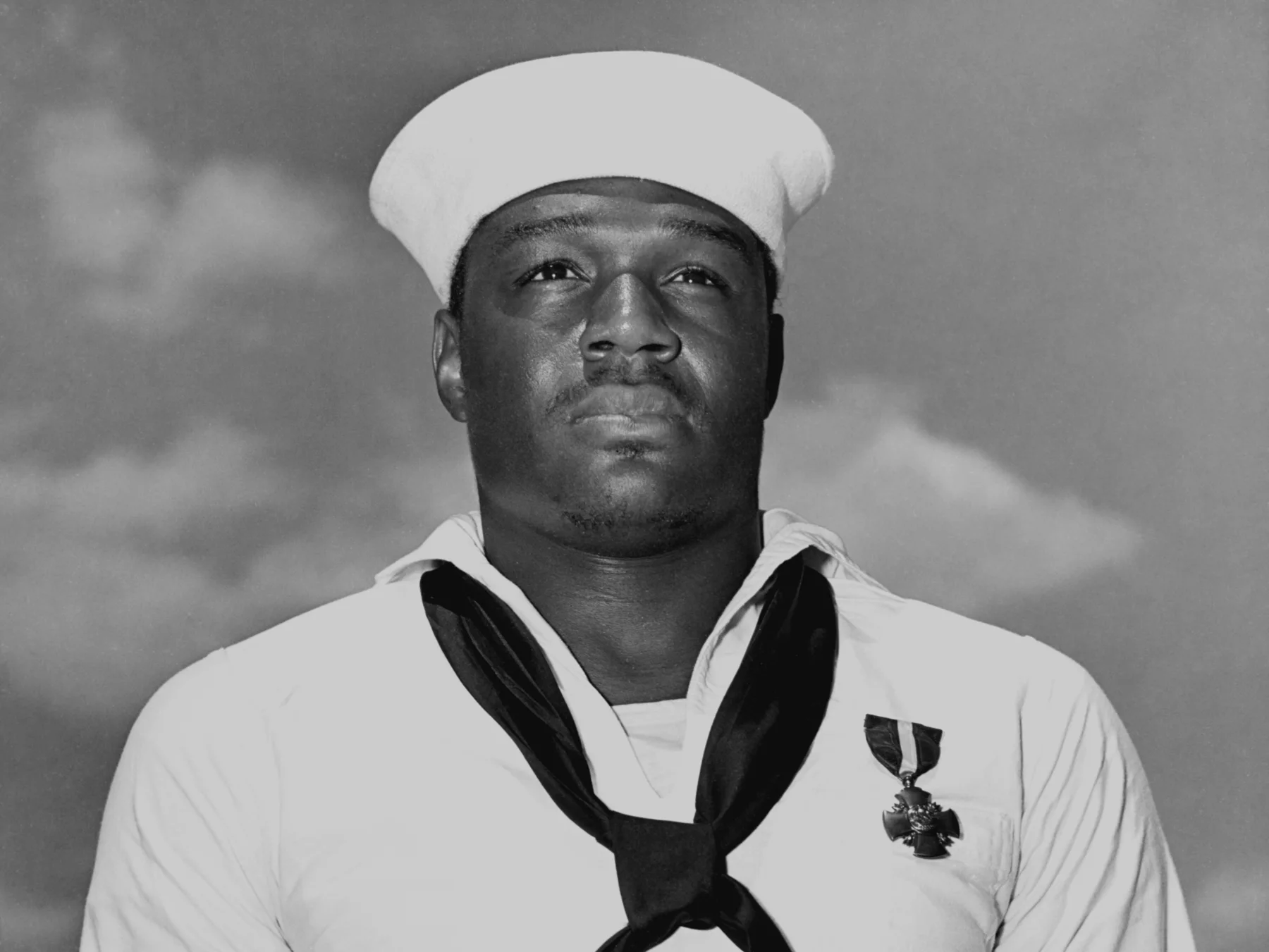 Doris Miller wearing the Navy Cross awarded for his actions at Pearl Harbor.