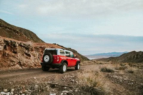 Stationary operator Bronco on an approved unpaved route.