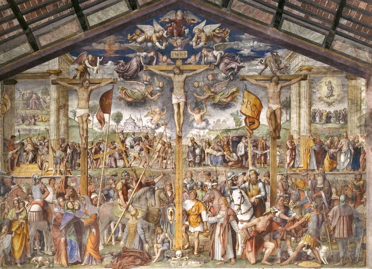 Bernardino Luini's monumental 1529 Crucifixion fills the church wall with a central cross and many surrounding Passion scenes