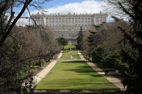The long green axis of Campo del Moro gardens rising toward Madrid’s Royal Palace