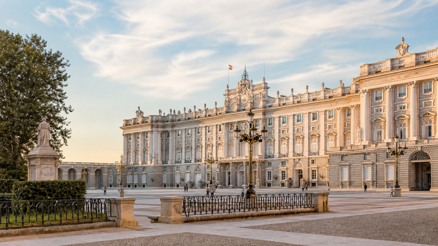 The Royal Palace and Plaza de Oriente in Madrid beneath an open sky