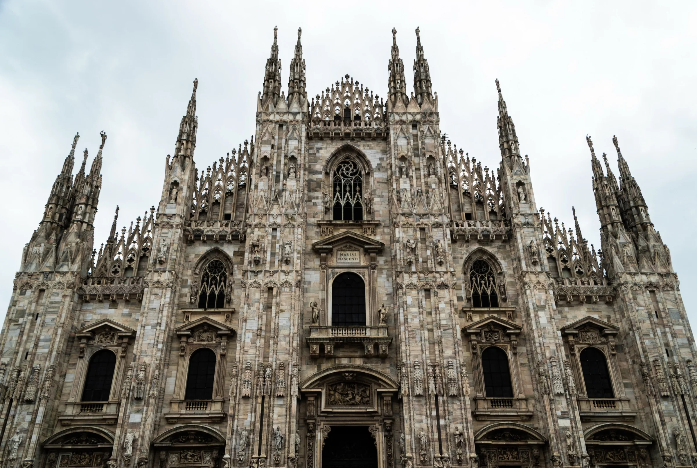 Milan Cathedral's marble façade rises above Piazza del Duomo