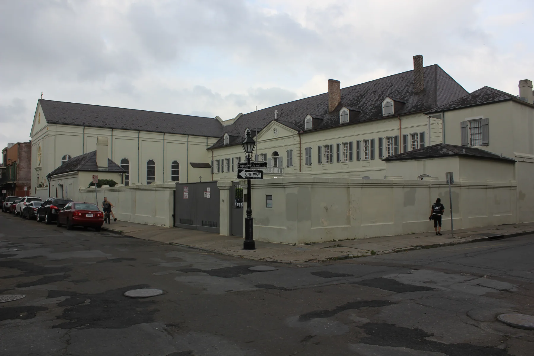 The Old Ursuline Convent presents a restrained French-colonial exterior on Chartres Street