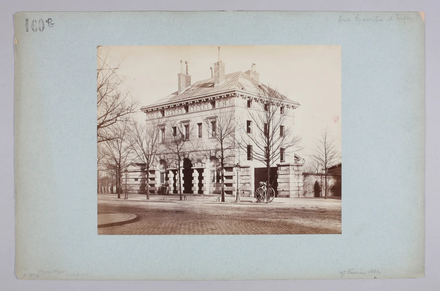 An 1881 archival photograph mounted on a blue collection card shows one of Ledoux's former Barrière d'Enfer pavilions.