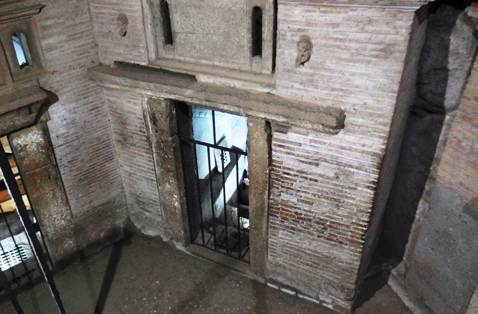 Brick and stone mausoleum structures survive within the San Sebastiano archaeological complex.