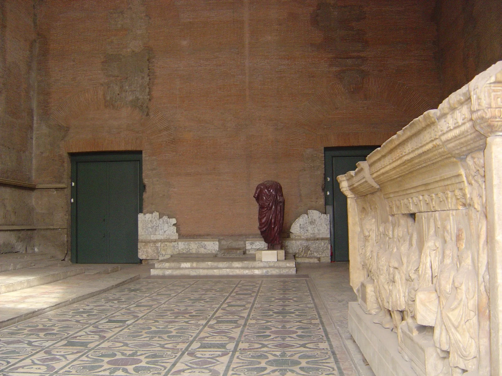 The restored interior of the Curia Julia preserves the scale of Rome's senate house.