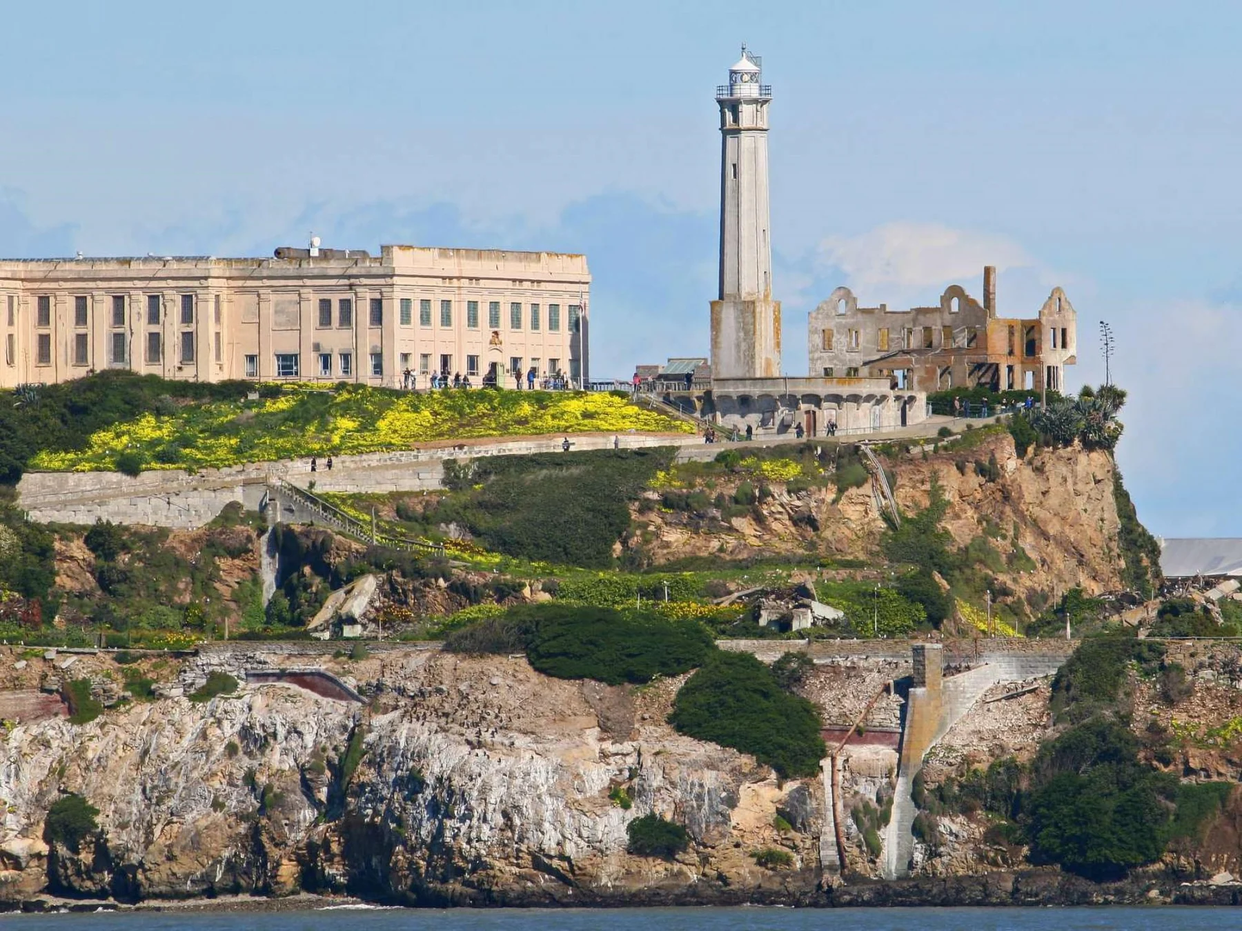 Alcatraz lighthouse, Cellhouse and ruined warden's residence from the water