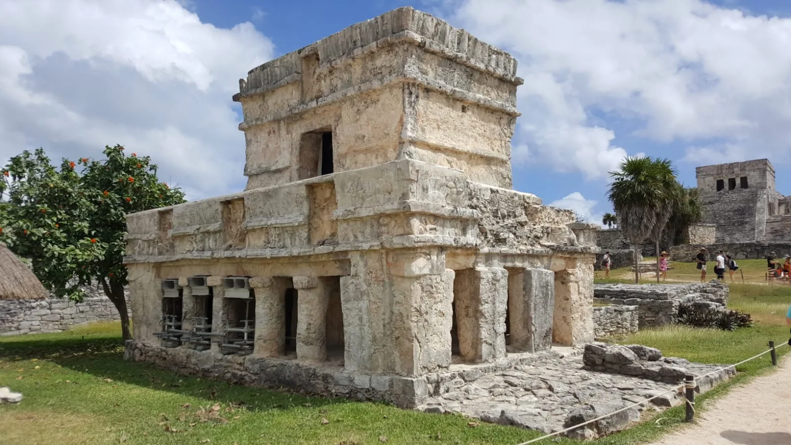 The Temple of the Frescoes shows layered construction, columns, modeled façades and conservation barriers.